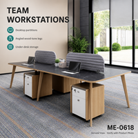 Bureau de travail rectangulaire moderne pour quatre personnes en bois avec dessus aspect pierre, écrans d'intimité gris et rangement sur pied
