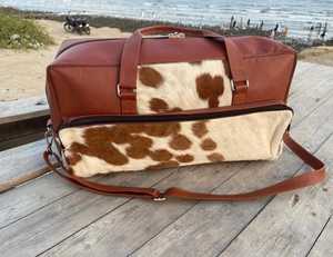 กระเป๋าเดินทางหนังแท้ลายขนสัตว์ กระเป๋าหนังวัวแบบถือสะพายสำหรับเดินทางช่วงสุดสัปดาห์ กระเป๋าเดินทางขึ้นเครื่องบิน OEM ส่งออกจำนวนมาก รุ่น LHTB-0107 - Product Image 4