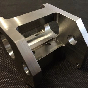 CNC machined <b>mounting</b> bracket / housing <b>block</b> with a semi-cylindrical saddle (bearing seat - Product Image 1