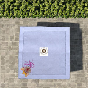 Elegant linen napkin with hibiscus and fern embroidery in one <b>corner</b>, adding tropical color and a fresh botanical touch - Product Image 3