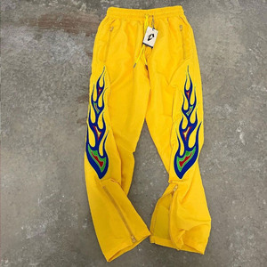 กางเกงแทร็คพิมพ์ลายเปลวไฟสีเหลือง สตรีทแวร์ จ็อกเกอร์ น้ำหนักเบา เอวยางยืด ผ้าไนลอน ผลิตตามสั่ง - Product Image 4