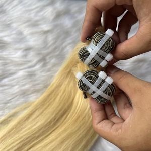 Vente en gros d'extensions de cheveux vietnamiens bruts de qualité supérieure, faisceaux blond clair, cuticule alignée complète, épais de la trame aux pointes - Product Image 4