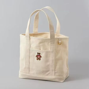 Bolsa de Mano de Lona Crema de Moda Sostenible para Mujer, Gran Capacidad, con Lindo Detalle de Osito de Peluche Bordado en Color Marrón - Product Image 1