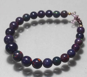Perles rondes d'opale noire naturelle 6-9 mm, pierres polies en provenance du Rajasthan HASNAIN GEMS pour la fabrication de bracelets - Product Image 3