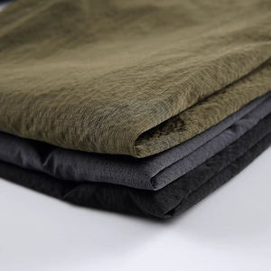 Pantalones de chándal anchos de nailon ligero con cremallera lateral personalizada para hombre, estilo urbano, cortavientos, joggers de hip hop al por mayor - Product Image 6