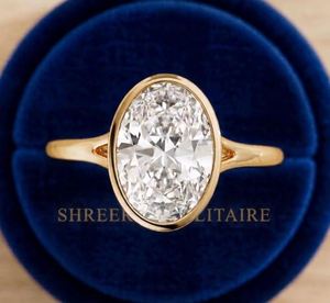 Anillo de compromiso con diamante ovalado cultivado en laboratorio certificado por IGI, engaste de bisel, solitario de tallo dividido en oro macizo de 10K, 14K, 18K, Shreeraj Solitair - Product Image 1