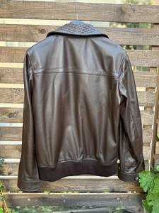 เสื้อแจ็คเก็ตหนังแท้แบบมีซิปและกระดุม พร้อมกระเป๋าด้านนอก 4 ช่อง ดีไซน์พรีเมียมสั่งทำพิเศษ และเสื้อแจ็คเก็ตแฟชั่นหนัง - Product Image 4