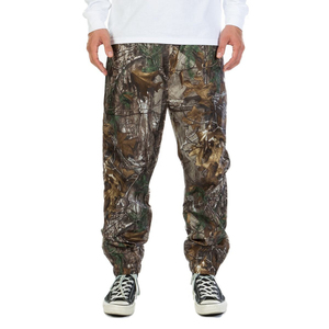 Pantalon de chasse pour homme, tissu polyester respirant, taille haute, fermeture éclair et bouton, poches avant, latérales et arrière. - Product Image 1