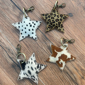 Nouveaux cheveux faits à la main sur cuir de vachette en forme d'étoile porte-clés Western en cuir véritable Cowboy Cowgirl porte-clés vache impression porte-clés - Product Image 3
