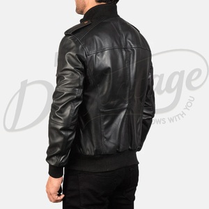 Sleek black genuine <b>leather</b> construction featuring a utility pocket and a traditional ribbed baseball collar. - Product Image 5