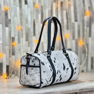 2026 New Luxury Design Fashion Cowhide Travel <b>Bags</b> Factory Price Handmade Multi Use Cowhide <b>Leather</b> Duffle <b>Bags</b> For Online Sale - Product Image 1