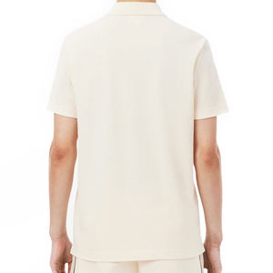 เสื้อโปโลผู้ชายทรงคลาสสิก ผ้าฝ้ายถักปิเก้ 100%  ตกแต่งแถบสีตัดกันที่ข้างเสื้อ  ปลายแขนเสื้อแบบริบ  ปักลายได้ตามต้องการ แขนสั้น - Product Image 2