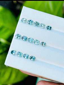 พลอยเพทายสีฟ้าธรรมชาติทรงรี รับรองโดย IGI น้ำหนักรวมเบา สำหรับทำเครื่องประดับ แหวน จี้ ต่างหู - Product Image 5