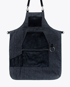 Capa de peluquería textil resistente con bolsillos de cuero y anillo para uso en salón - Product Image 1