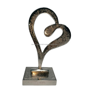 Escultura decorativa de aluminio con acabado de níquel para decoración del hogar Escultura de metal Artículos de regalo de Diwali - Product Image 1