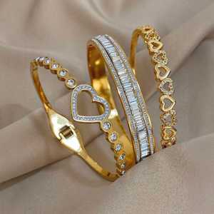 เครื่องประดับแฟชั่นมินิมอลสุดฮิต ขายส่ง กำไลข้อมือรูปใบโคลเวอร์ชุบทอง 18K สำหรับผู้หญิง ชุดกำไลแบบซ้อนได้ กำไลข้อมือและกำไล - Product Image 5