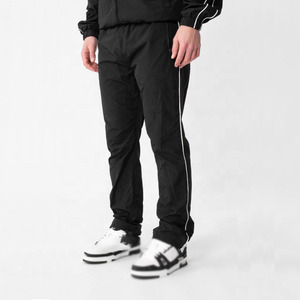 ชุดวอร์มกันลมสำหรับผู้ชาย เสื้อแจ็คเก็ตและกางเกงกีฬาน้ำหนักเบา รับทำโลโก้ตามสั่ง OEM ODM เสื้อผ้ากีฬาแนวสตรีท - Product Image 5