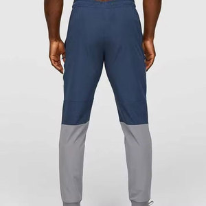 Conjunto de Sudadera con Cremallera y Pantalones Deportivos Impermeables de Poliéster 100% Ecológico, Color Personalizado OEM, para Hombre, Chaqueta Cortavientos de Invierno, Traje Deportivo 2 - Product Image 1