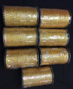 Fil d'or de qualité supérieure fabriqué à partir de fibres métalliques premium, idéal pour la broderie, la couture, les appliques, les badges, les uniformes et les points décoratifs. - Product Image 1