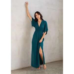 เดรสยาวแขนยาวครึ่งแขนสำหรับผู้หญิง ดีไซน์หรูหรา ผลิตจากผ้าฝ้ายธรรมชาติ 100% เป็นมิตรต่อสิ่งแวดล้อม เหมาะสำหรับใส่ในชีวิตประจำวัน มีจำหน่ายแบบสั่งซื้อจำนวนมาก - Product Image 6