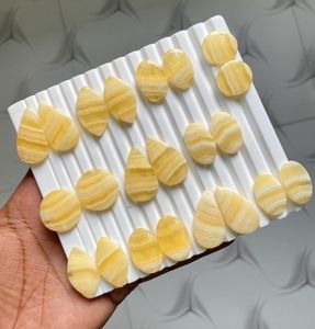 Vente en gros : Paire assortie de cabochons en aragonite jaune naturelle, pierres précieuses brutes polies, forme ovale à dos plat, pour la fabrication de bijoux - Product Image 4