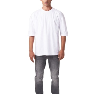 เสื้อยืดคอตตอน 100% สีพื้นแบบกำหนดเอง ไซส์ใหญ่พิเศษ สวมใส่สบาย ระบายอากาศได้ดี เป็นมิตรกับสิ่งแวดล้อม แห้งเร็ว ขายส่ง รับออกแบบ OEM - Product Image 1