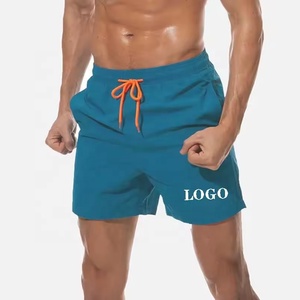 Short de plage avec poches latérales pour hommes Short pour homme en coton multicolore à séchage rapide Short de bain pour homme uni - Product Image 1