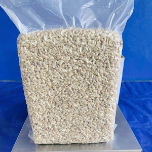 Trusted Factory Split Cashews SANTIGO Broken Cashew <b>Nuts</b> <b>Kernels</b> Kaju Badam OEM, ODM Packaging - Product Image 1