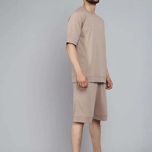 ชุดเสื้อยืดฟิตเนสฤดูร้อนผ้าโพลีเอสเตอร์/คอตตอน เนื้อหนา ระบายอากาศได้ดี ยูนิเซ็กซ์ คุณภาพสูง สกรีนลายตามสั่ง กางเกงขาสั้น เสื้อยืดผู้ชาย - Product Image 1