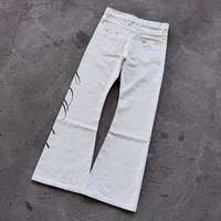 Jean droit vintage en coton coupe slim pour homme, style streetwear évasé, délavé, hip-hop, avec imprimé lettres uni et décoration rivets, utilitaire