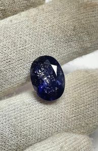 Iolite pierre de soleil taille ovale, naturelle, facettée, scintillante et chatoyante à l'intérieur. - Product Image 2