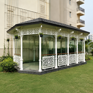 Pergola de jardin en verre blanc avec colonnes ornées, panneaux en treillis et balustrades décoratives - Product Image 3