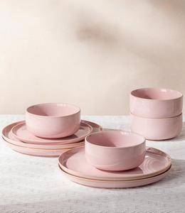 Ensemble d'assiettes et de bols en céramique rose poudré, finition brillante, design rond élégant, empilables, vaisselle durable pour une table moderne - Product Image 1
