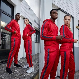 Survêtement unisexe rouge à capuche, manches longues, couleur unie, style sportif avec poches latérales, fermeture éclair, respirant, en polyester, pour l'automne - Product Image 1