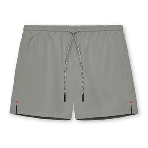 Shorts de sport modernes en toile solide, respirants et à séchage rapide, confortables, en polyester/nylon, coupe ample pour la course et l'entraînement. - Product Image 1