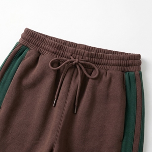 กางเกงวอร์มลายทางสีน้ำตาลเขียว |   กางเกงจ็อกเกอร์แบบมีแผงข้างตัดกัน |   กางเกงวอร์มสตรีทแวร์ทรงโอเวอร์ไซส์ |   ผู้ผลิต OEM ตามสั่ง - Product Image 3