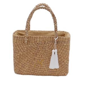 Bolso de Jacinto de Agua Hecho a Mano: Bolso de Playa de Paja Tejida con Borla - Product Image 1