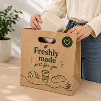 Sac rectangulaire en papier kraft biodégradable et écologique personnalisé avec poignées découpées pour l'emballage commercial et les achats