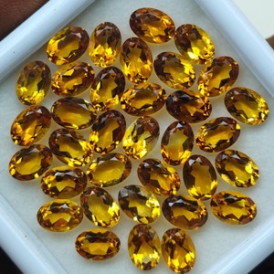 พลอยซิทรินแท้ธรรมชาติทรงรีขนาด 7x5 มม. สีเหลืองทองเจียระไน แบรนด์ HASNAIN GEMS สำหรับทำแหวน ต่างหู และเครื่องประดับ - Product Image 6