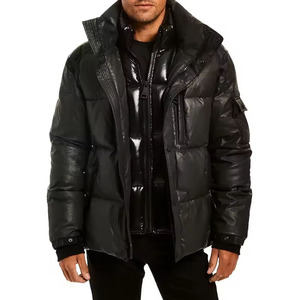 Blouson matelassé noir en similicuir avec un design double couche, qualité supérieure, style streetwear, col montant, chaud et confortable. - Product Image 1
