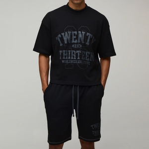 เสื้อยืดโอเวอร์ไซส์ลายวาฟเฟิลพร้อมกางเกงขาสั้นสำหรับผู้ชาย สตรีทแวร์คุณภาพพรีเมียม ผ้าฝ้าย 100% ชุดลำลองสำหรับฤดูร้อน - Product Image 1