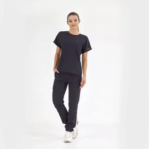 Conjunto de Uniforme Médico de Lona de Algodón para Clínica de Cardiología con Logotipo Personalizado, Transpirable, Suave, Cuello en V, Pantalones Ajustados, Venta al por Mayor - Product Image 1