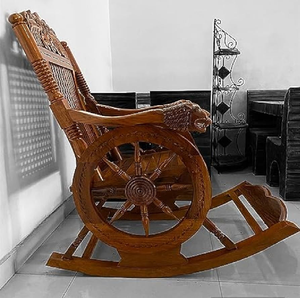 Fauteuil à bascule traditionnel en bois avec accoudoirs sculptés en forme de lion et cadre latéral à roulettes, disponible à prix de gros. - Product Image 1