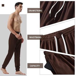 กางเกงขายาวผู้ชายผ้าไอซ์ซิลค์ลำลองสไตล์สตรีทแวร์ ออกแบบโลโก้ OEM ได้ตามต้องการ สำหรับฤดูร้อนและฤดูหนาว แห้งเร็ว ทรงเก้าส่วน - Product Image 4