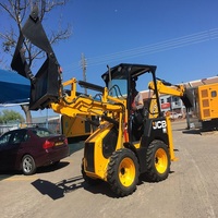 Chargeuse compacte sur chenilles JCB 1CX haute performance avec système hydraulique robuste pour entrepreneurs