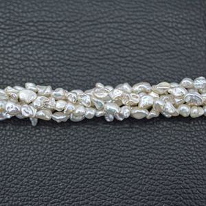 ไข่มุกน้ำจืดธรรมชาติสีขาวบริสุทธิ์ AAA ขนาด 8 มม. 10 มม. รูปทรงไม่สม่ำเสมอ แบบใหม่ สำหรับทำเครื่องประดับ มีจำหน่ายในราคาส่ง - Product Image 4