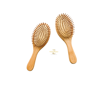 Brosse à cheveux en bambou écologique avec poils naturels pour des soins capillaires durables - Product Image 2