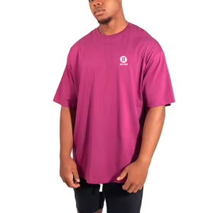 เสื้อยืดคอกลมแขนสั้นทรงหลวมสำหรับผู้ชาย คุณภาพดีที่สุด สีตามสั่ง ผลิตจากผ้าฝ้าย 100% ระบายอากาศได้ดี มีทุกขนาด - Product Image 1