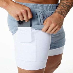 Men's Light Blue Quick Dry Sport Shorts With Pockets Elastic Waist <b>Mid</b> Length Solid Color Knitted Polyester - Product Image 5