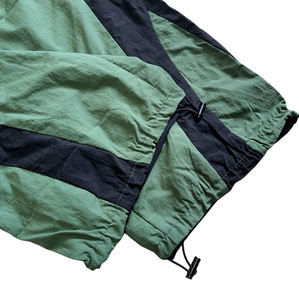 Custom Mens Oversized Nylon Tracksuit Bottoms Y2K Streetwear Wide Leg Baggy Windbreaker Side Stripe Pants with <b>Toggle</b> Hem Ankle - Product Image 5
